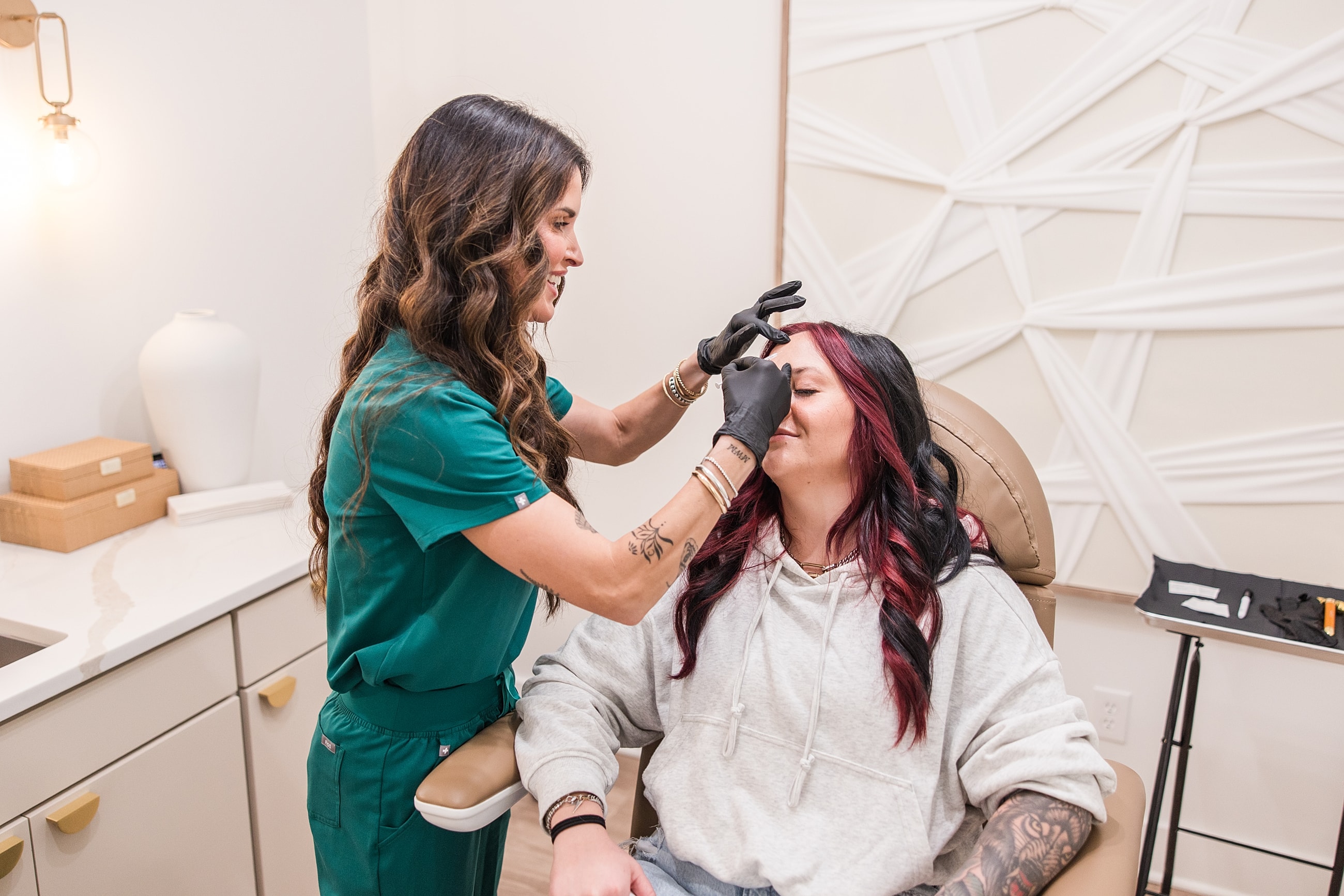 Cosmetic procedure in a modern salon setting.